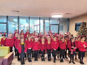 Choir sing at North West Cancer Centre